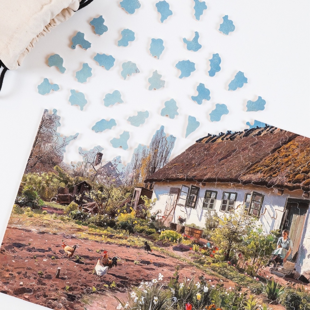 Puzzle-Jeune-fille-devant-une-maison-350-2