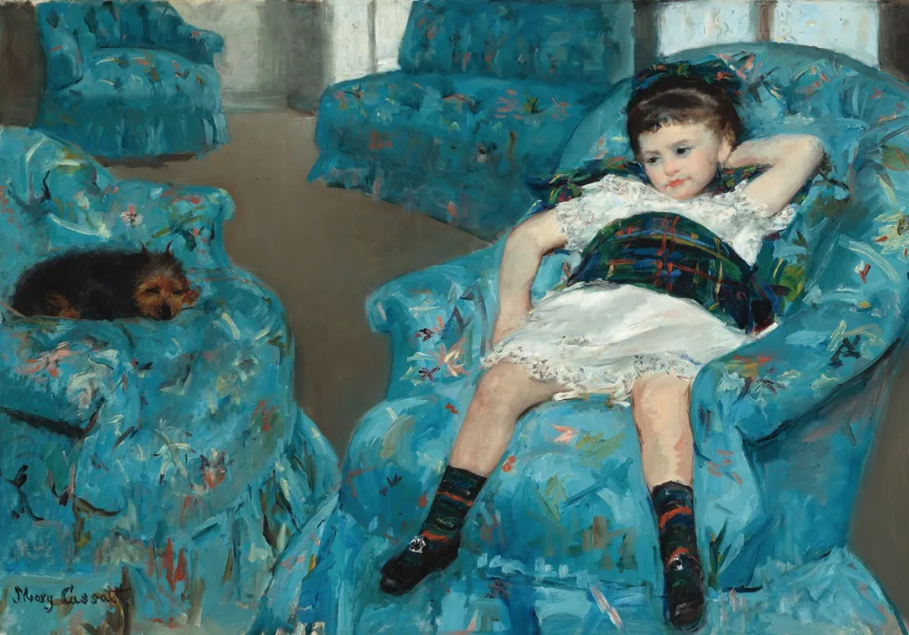 PMW-petite-fille-fauteuil-bleu.webp